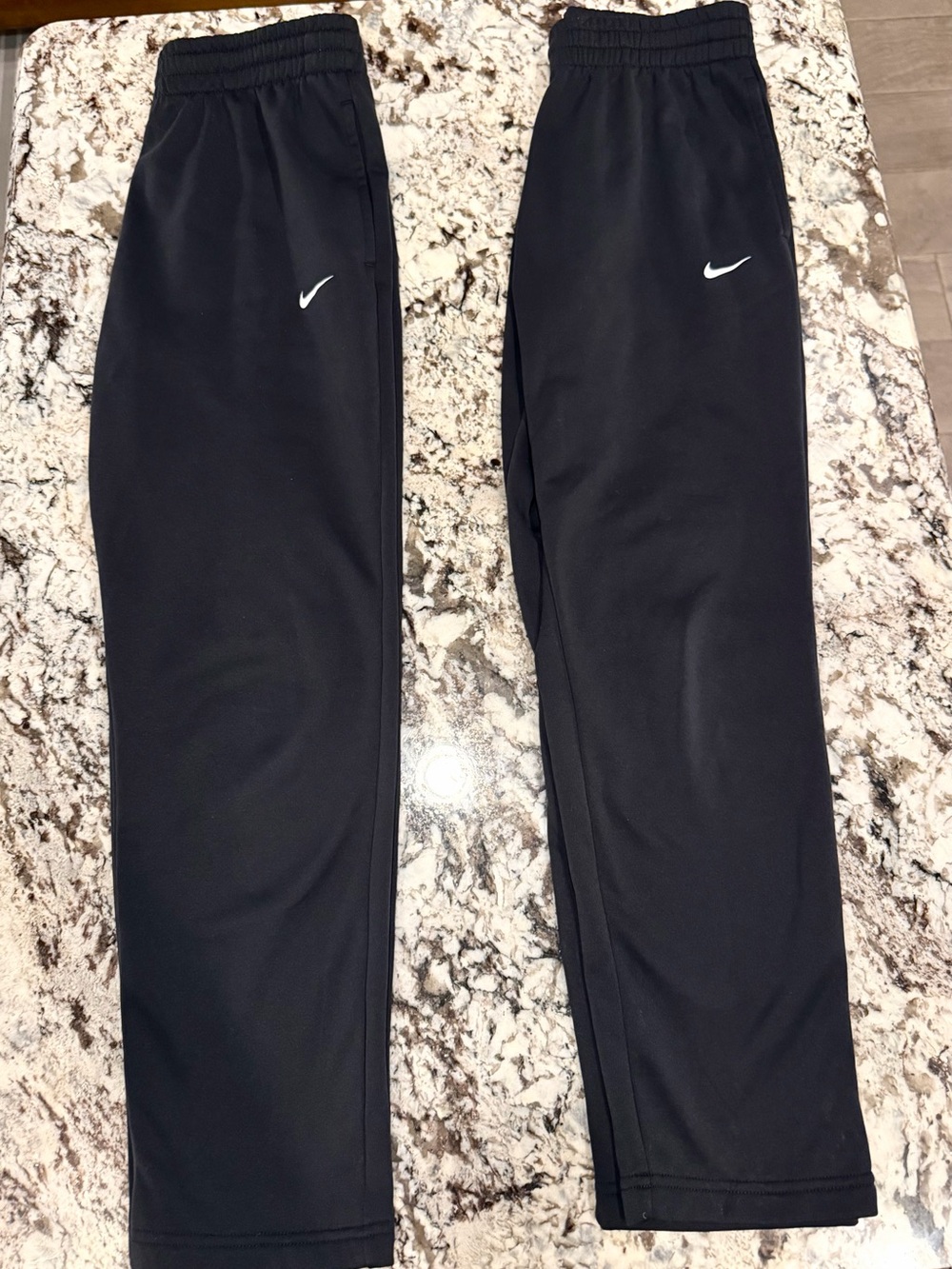 Nike Black Track Pants with White Swoosh Logos